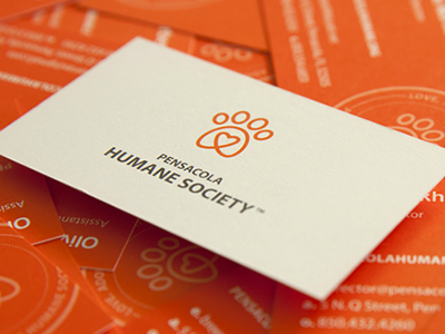 Pensacola Humane Society Rebrand group heart humane logo mark monoline orange paw people shelter simple visual brand