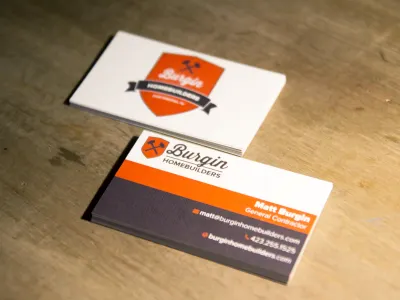 Burgin Homebuilders business card banner business card crest hammer homebuilder logo