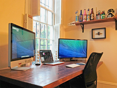 Workspace beer dice extra large harmon kardon imac macbook pro pencils pens rhino beetle rogue shark teeth workspace