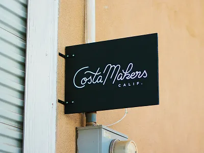 Costa Makers Sign black and white branding california costa mesa coworking space custom font logo outdoor script sign wood