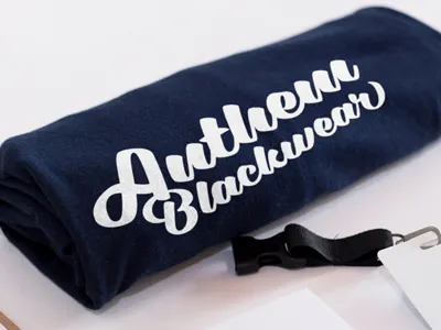 Use of Adelia apparel badge bold clothing lettering marker packaging plump script sign vintage