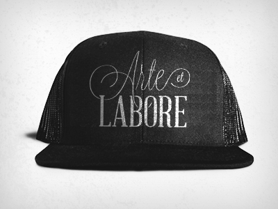 Arte et Labore hat latin typography