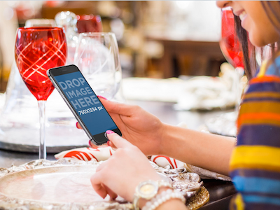 Portrait Mode iPhone 6 Mockup - Girl Using iPhone 6 at Dinner app marketing business design mockup ios apps iphone iphone 6 iphone mockup responsive screenshot generator startup marketing ui design ux design