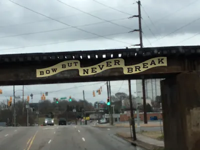 Bow But Never Break graffiti nc raleigh typography