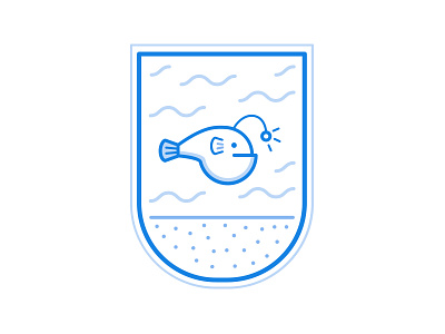 In Depth Tutorials badge blue fish sea