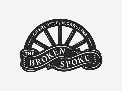 The Broken Spoke broken spoke logo sign stencil wagon wheel