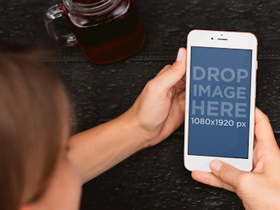 White iPhone 6 Mockup of a Woman at a Café app marketing app marketing tools apple devices ios ios apps iphone iphone 6 iphone mockup online marketing tools startup marketing stock photo mockup stock photo template