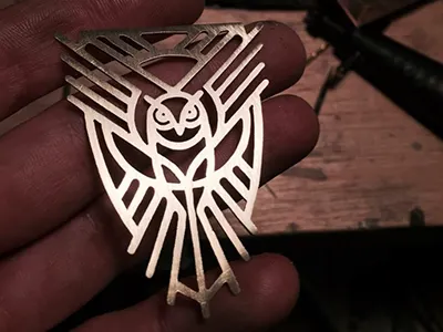 Arawak Head Badge badge bicycle logo mark metal owl