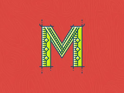 M cap capital green lettering m red