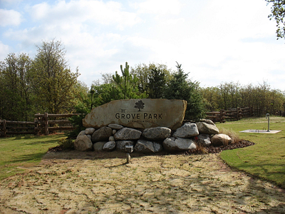 The Grove Park - Neighborhood Entrance Signage boulder engraving hardscape landscaping neighborhood real estate signage
