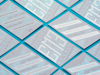 EME Design Studio Business Cards blue business cards flourish foil ornate print type white