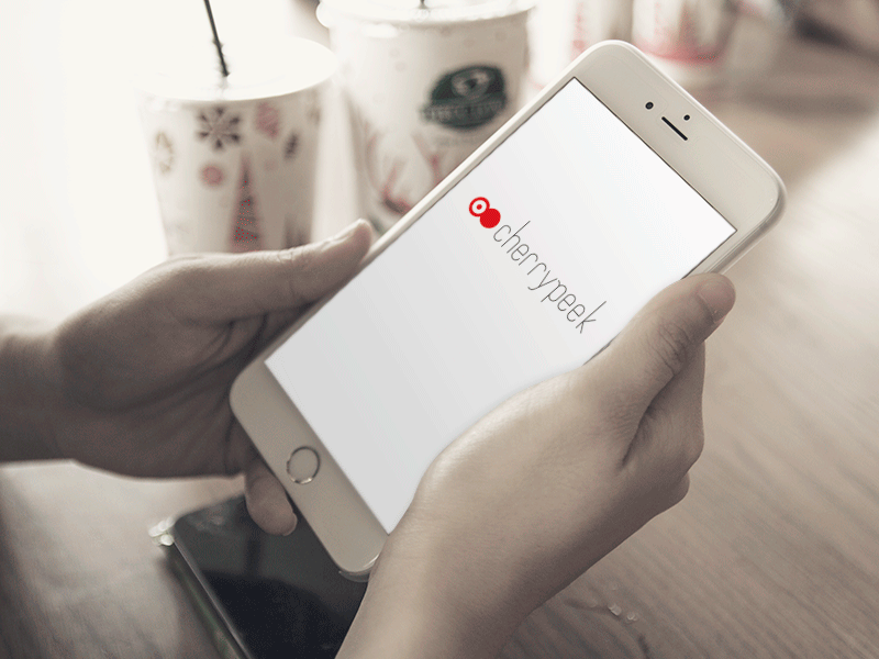 Choosing Cherrypeek launch screen cycle hand holding iphone launch logo mobile red screen splash white