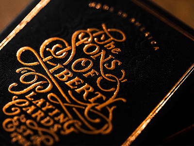 Sons of Liberty Playing Cards tuckcase gold foil hand lettering illustration letterpress playing cards script sons of liberty typography vintage woodcut