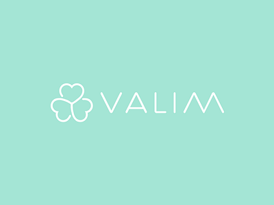 Valim Logo aesthetic clinic flower health logo lucky clover wellness