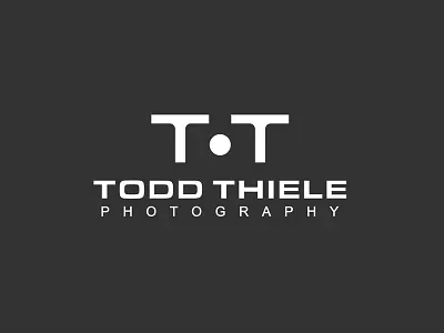 Todd Theile camera logo logomotive photographer t