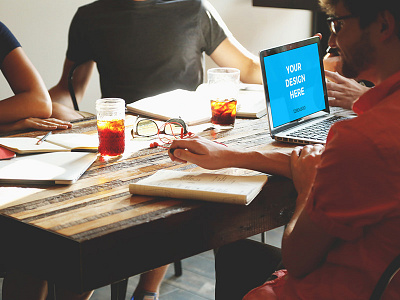 Coworking with MacBook Pro on wooden table coworking free macbook mockup networking office smartmockups