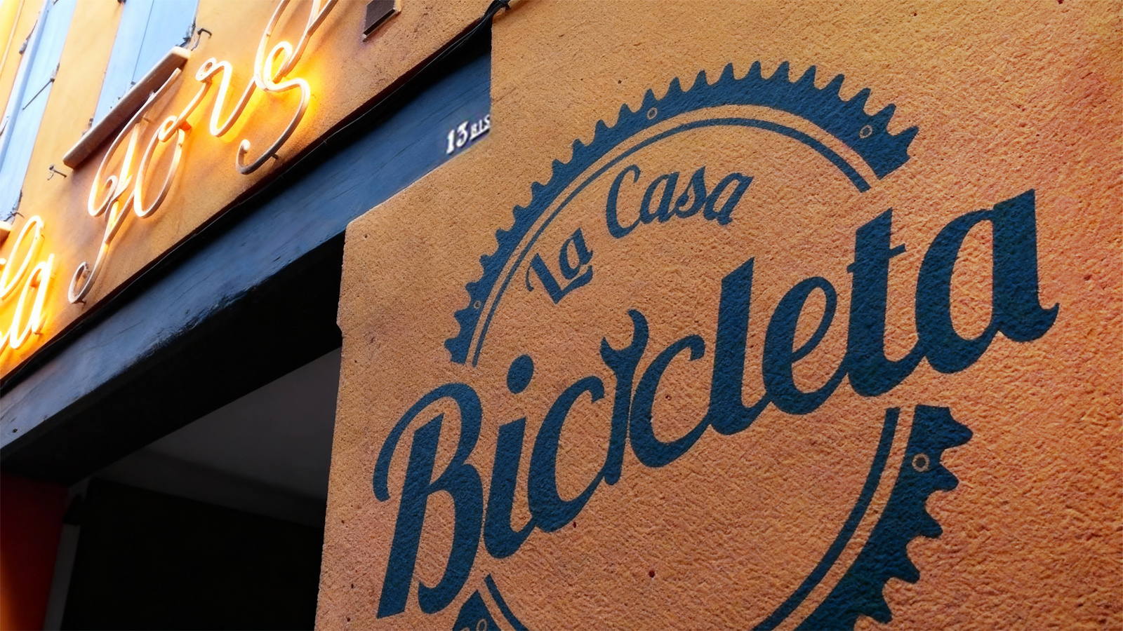 La Casa Bicicleta bicycle brand design branding community creative process eco friendly flexible logo graphic design identity design illustration logo logo sketch merchandise minimalist modular logo orange red typography visual identity wall art