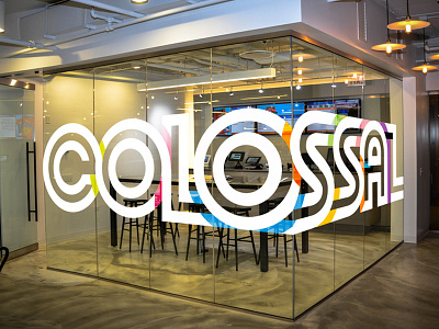 Where Colossal Ideas Meet art deco color colossal conference room environmental fun graphic inline logo office retro window