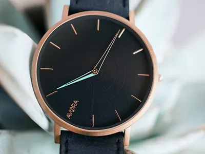 AVØRA branding compass crafted cyan design detail picture watch