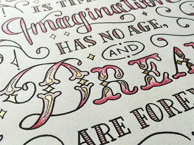 Walk Disney quote, detail shot disney display gold handlettering lettering pink stars typography