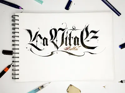 La Vita E Bella handswriting tattoo