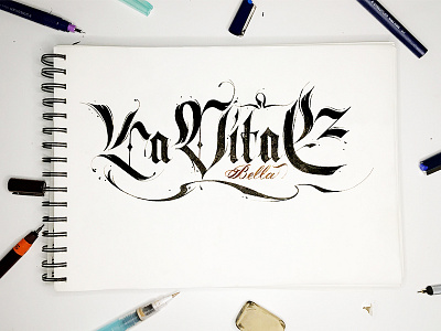 La Vita E Bella handswriting tattoo