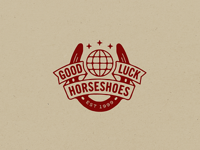 Good Luck globe good luck horseshoe logo mark