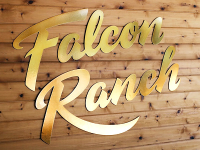 Falcon Ranch sign brush script lettering metal sign
