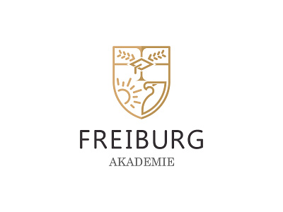 Freiburg Akademie Sprachschule academy eagle education freiburg germany gradudation hat logo olive shield sun university