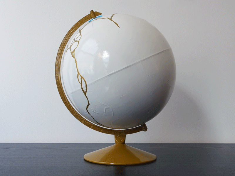 Fragile broken cracks earth globe kintsugi