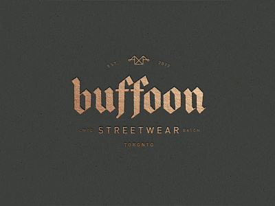 buffoon clothing hat icon idiot jester lettering logo mark old english streetwear type typography