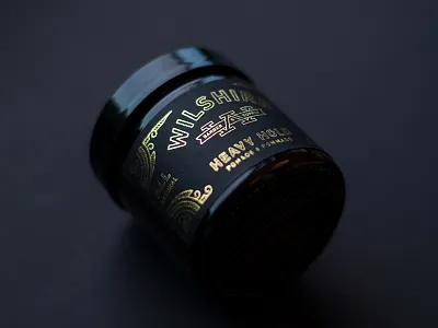 Wilshire Barber & Supply barber barbershop branding foil gold line work packaging pomade type