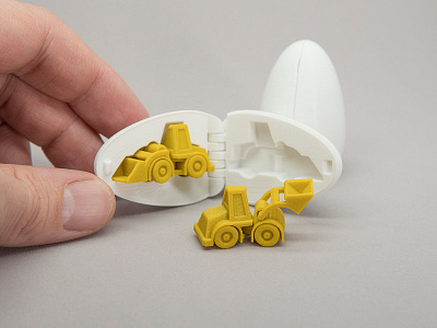 3D Printable Surprise Egg - #3 Tiny Wheel Loader 3d 3d printing print in place stocking stuffers surprise egg toy