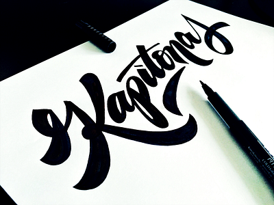 Kapitonas (captain) brush calligraphy custom flow lettering script sharp sketch type