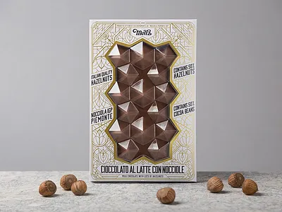 Meltz Chocolates chocolate chocolate design chocolates foxtrot hazelnut hazelnuts hotstamping packaging packaging design typography