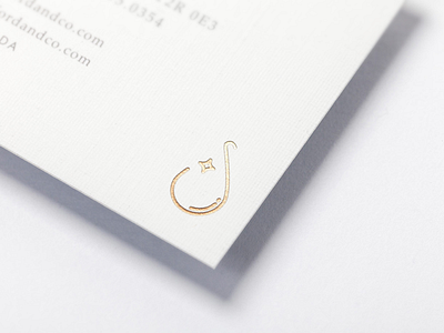 simply water branding gold foil logo mark