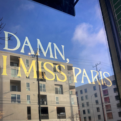 23k Gold leaf on glass for Damn I Miss Paris - West Adams 23k branding design environmental design gilding gold gold leaf hand painted sign graphics sign painter sign painting water gilding