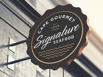 Cape Gourmet Signature Seafood Signage branding cape gourmet graphic design logo logo design packaging packaging design seafood seal sign signage waves