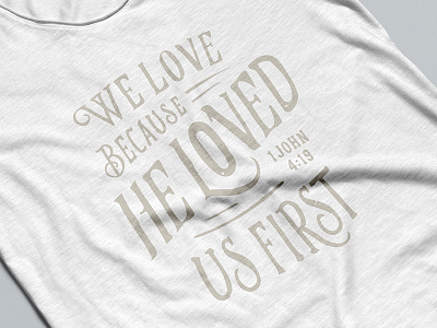 1 John 4:19 apparel bible lettering shirt typography verse