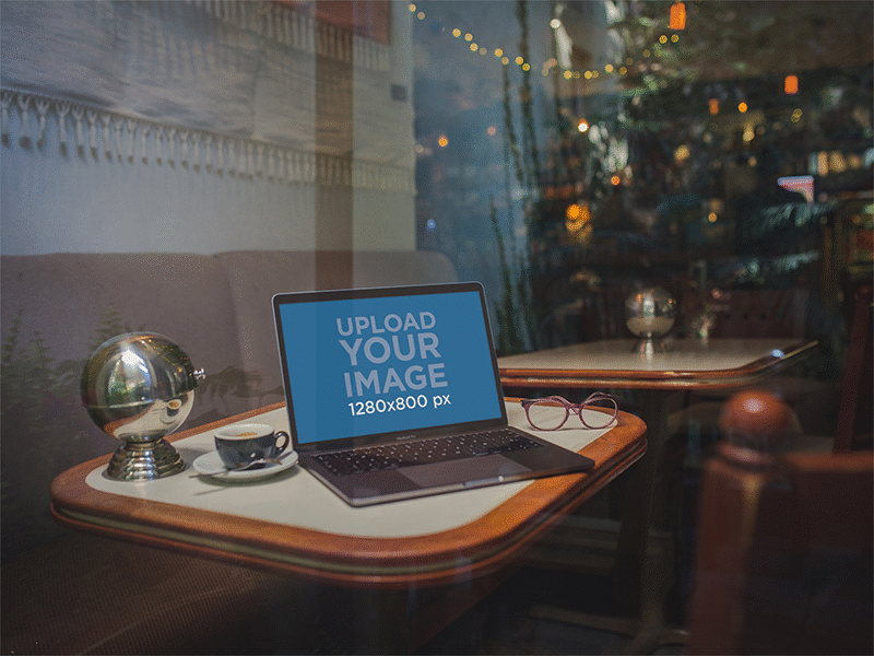 Mockup Of A Macbook Through The Window On A Restaurant Table Wit digital mockup macbook macbook air macbook pro macbook pro retina mockup mockup generator ui ux