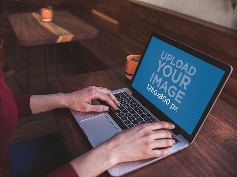 Macbook Mockup Being Used On A Wooden Desk digital mockup macbook macbook air macbook pro macbook pro retina mockup mockup generator ui ux