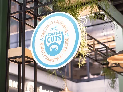 Coastal Cuts Sign barber barbershop beach hair negative space negative space logo scissors signage summertime vintage badges vintage barber designs