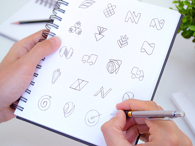 Nelio Drawing Sketches: symbol, mark, monogram, negative space brand brand identity identity letter lettermark logo logo type logodesign logomark logos logotype mark monogram negative space negative space negative space logo symbol