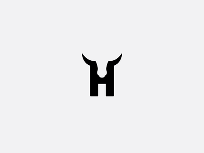 H Tattoo black cattle cow h horns logomark negative space tattoo