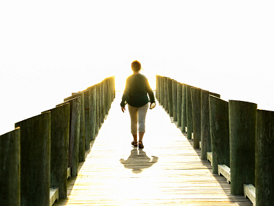 Walking to Unknown bridge bridge walk bright light wooden bridge