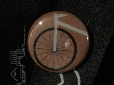 Actual button in real life! 1", quick photo in the dark. design illustration logo vector