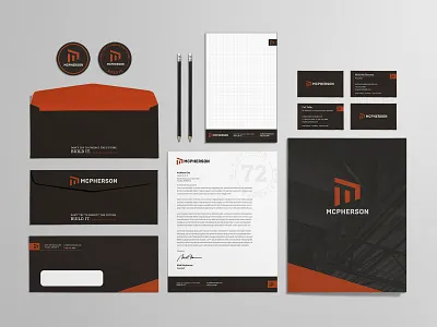 McPherson Stationery badge brand branding business card construction contractor design envelope folder icon industrial kansas logo m mcpherson modern orange stationery typography