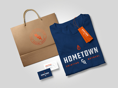 Hometown Co. branded items bag bag design brand branding business card flatlay hang tag identity layout packaging screenprinting shop shopping bag tag design tshirt design