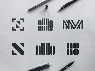 Nuno Melo - Logo Concepts black and white logo camera lens focus logomark icon design identity designer n m monogram initials nm clever letters nuno melo portugal photo camera photography mark sketch process smart symbol