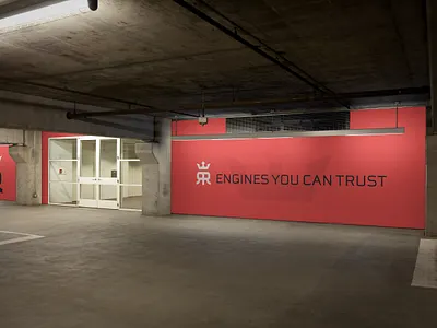 Reina Rebuilds Wall Wrap branding cars crown engines garage identity logos outdoor vinyl wrap wall wrap